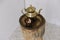 Retro kettle on a tea-table. Golden teapot. Elegant antique golden coffee set. Morning tea