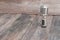 Retro microphone. Vintage style on the wooden floor background
