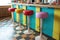 retro milkshake bar counter with colorful stools