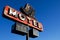 Retro motel sign blue sky