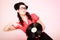 Retro music. Pinup girl with vinyl record