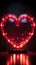 Retro neon hearts Bright, vintage sign on a striking black backdrop