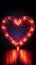 Retro neon hearts Bright, vintage sign on a striking black backdrop