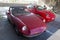 Retro and new Alfa Romeo cars and a motorcycle