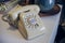 Retro photo of classic telephone on desk