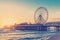 RETRO PHOTO FILTER EFFECT: Blackpool Central Pier at Sunset with Ferris Wheel, Lancashire, England UK