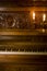 Retro piano with candle light