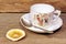 Retro porcelain tea cup and plate with silver spoon