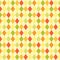 Retro primitive seamless rhombus background in autumn colors