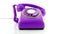 Retro purple  phone ringing of the hook isolated on white