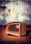 Retro radio on grunge wall background