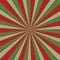 Retro red and green sunburst background in Christmas colors with radial striped pattern