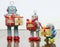 Retro robots with gifts on a old wooden floor