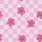 Retro seamless pattern with flowers on checkered background. Simple floral print for fabric, paper, T-shirt. Doodle vector