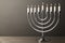 Retro Silver Hanukkah Menorah with Burning Candles. 3d Rendering