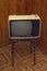 Retro soviet portable analog tv on stool