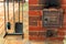 Retro stove of bricks close-up in a wooden rural house