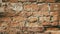 Retro style grunge background of old crumbled orange brick wall