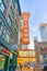 Retro style illuminated sign of iconic Chicago Theater among architecture and cityscapes  of city in Illinois, USA