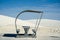 Retro style picnic rest area tables and structures inside of White Sands National Park in New Mexico