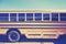 Retro stylized close up picture of a school bus side