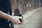 Retro stylized photo of young man photographer with camera