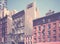 Retro stylized picture of New York diverse architecture, Manhattan, USA