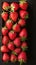 Retro sweetness Strawberries displayed on a black wooden vintage background