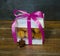 Retro sweets with caramel on wood in gift box