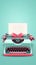 Retro teal typewriter with a pink ribbon on paper, minimalist design concept