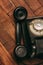 retro telephone black on a wooden floor classic