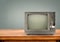Retro television on wood table