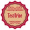 Retro TEST DRIVE magenta badge.