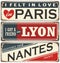 Retro tin sign collection with French cities