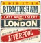 Retro tin sign collection with UK city names