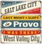 Retro tin sign collection with USA city names