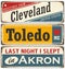 Retro tin sign collection with USA city names