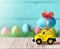 Retro toy car with Easter egg on the roof on spring background. Easter concept