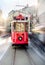 Retro tram on Taksim Istiklal Street in Istanbul, Turkey in a summer day