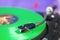 Retro turntable with green vinyl record