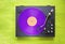 Retro turntable with purple vinyl record