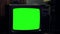 Retro tv with green screen. Night tone.