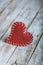 Retro valentine heart on grunge wood background.