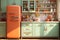 Retro Vibes: Kitchen with Orange and Green Refrigerator, a Retro Delight. Generative AI