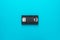 Retro video tape over turquoise blue background