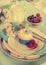Retro vintage filter beautiful butterfly cupcake and berries