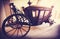 Retro vintage filtered picture of an old wooden carriage.