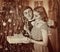 Retro vintage portrait of couple Christmas party. Black and white .