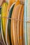 Retro vintage surfboards lined up in a local surf shop