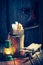 Retro winter cottage with snow and oil lamp